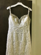 Load image into Gallery viewer, Kitty Chen &#39;Chelsea&#39; size 6 used wedding dress  close up view on hanger
