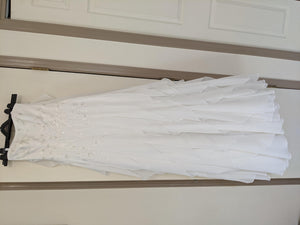 David's Bridal 'Strapless' size 4 used wedding dress front view on hanger