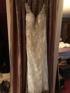 Maggie Sottero 'Greer' size 2 used wedding dress front view on hanger