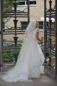 Reem Acra'Lily' size 0 used wedding dress back view on bride