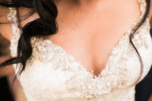 Load image into Gallery viewer, Kitty Chen &#39;Chelsea&#39; size 6 used wedding dress view of bust line on bride
