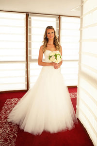 Monique Lhuillier 'Infinity' size 6 used wedding dress front view on bride