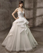 Load image into Gallery viewer, Badgley Mischka &#39;Ariana&#39; size 6 used wedding dress front view on model
