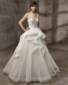 Badgley Mischka 'Ariana' size 6 used wedding dress front view on model
