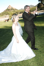 Load image into Gallery viewer, Custom &#39;Strapless Beaded&#39; size 4 used wedding dress side view on bride
