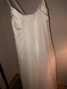 Carolina Herrera 'Chiffon' size 12 used wedding dress back view on hanger