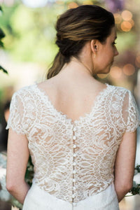 Carolina Herrera 'Claudette' size 10 used wedding dress back view on bride
