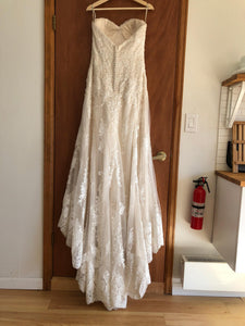Maggie Sottero 'Viera' size 10 used wedding dress back view on hanger