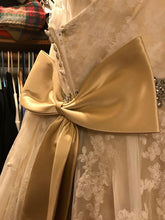 Load image into Gallery viewer, Da Vinci &#39;50231&#39; size 12 used wedding dress back view on hanger
