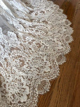Load image into Gallery viewer, Watters &#39;Lyric 3012B&#39; size 12 used wedding dress view of hemline
