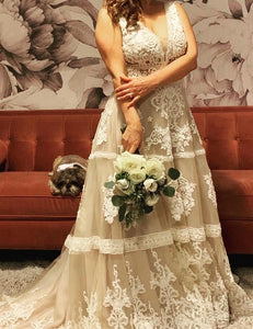 Randi Fenoli 'Spring 2018' size 10 used wedding dress front view on bride