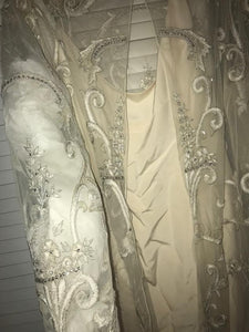 Reem Acra '9019' size 8 used wedding dress back view on hanger