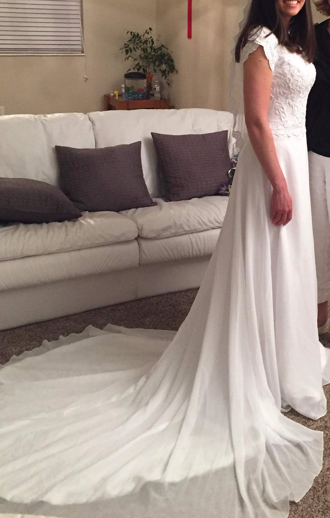 Bonny Bridal 'Sequin' size 4 used wedding dress side view on hanger