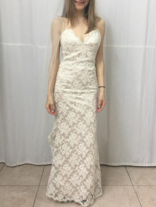 Jim Hjelm 'French Lace' size 0 used wedding dress front view on bride