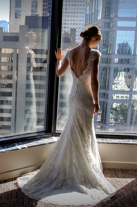 Allure Bridals '9000' size 6 used wedding dress back view on bride
