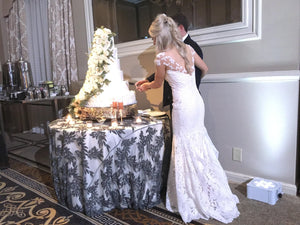 Romona Keveza 'L5101' size 2 used wedding dress back view on bride