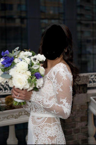 Lian Rokman 'Sea Shells' size 4 used wedding dress side view on bride