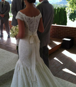 Maggie Sottero 'Amara Rose' size 6 used wedding dress back view on bride
