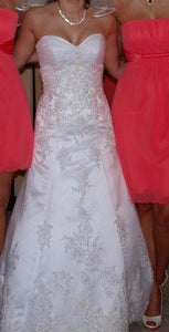 Maggie Sottero 'Straplesss' size 6 used wedding dress front view on bride