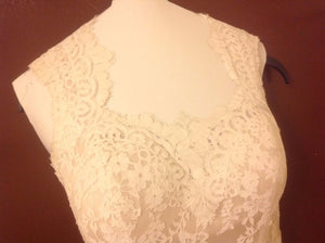 Maggie Sottero 'Londyn' size 4 used wedding dress front view on hanger