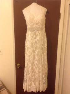 Maggie Sottero 'Londyn' size 4 used wedding dress front view on hanger