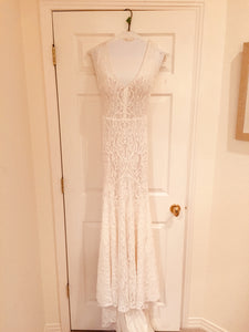 Daalarna 'Sensuous' size 2 used wedding dress front view on hanger