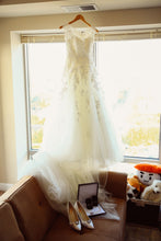 Load image into Gallery viewer, Pronovias &#39;Mia&#39; size 2 used wedding dress front view on hanger
