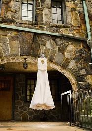 Mackenzie Michaels 'Keyhole Back' size 4 used wedding dress front view on hanger