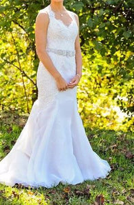 Mackenzie Michaels 'Keyhole Back' size 4 used wedding dress front view on bride