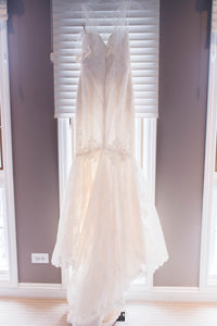 Amy Kuschel 'Monroe' size 0 new wedding dress back view on hanger